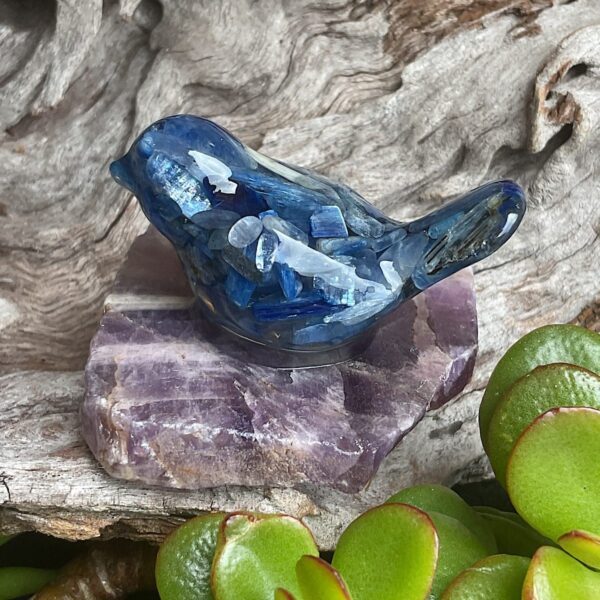 Blue kyanite bird made from resin on chevron amethyst base